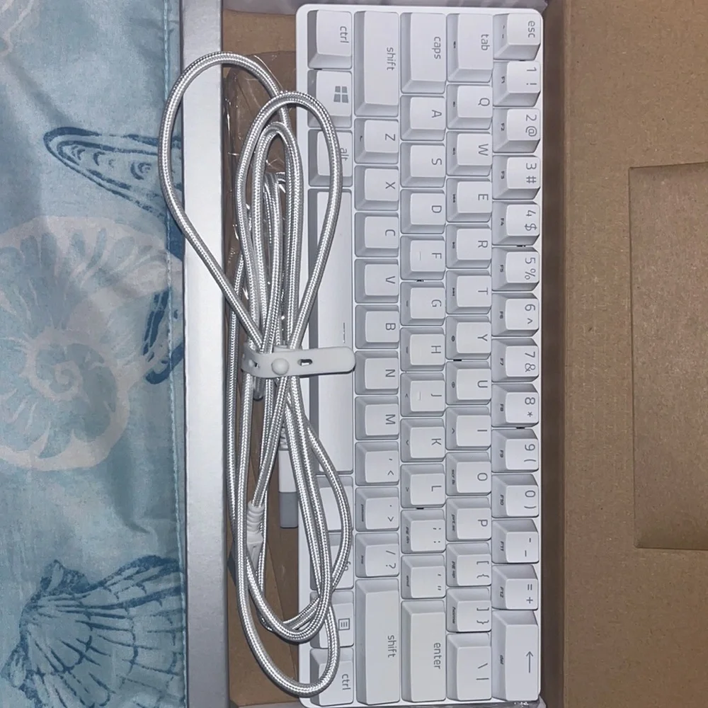 Brand new huntsman mini gaming keyboard never used.